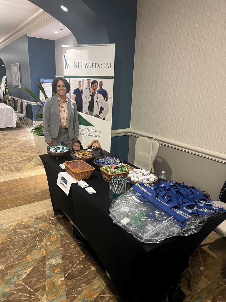 Anne White standing beside the CBH Medical booth